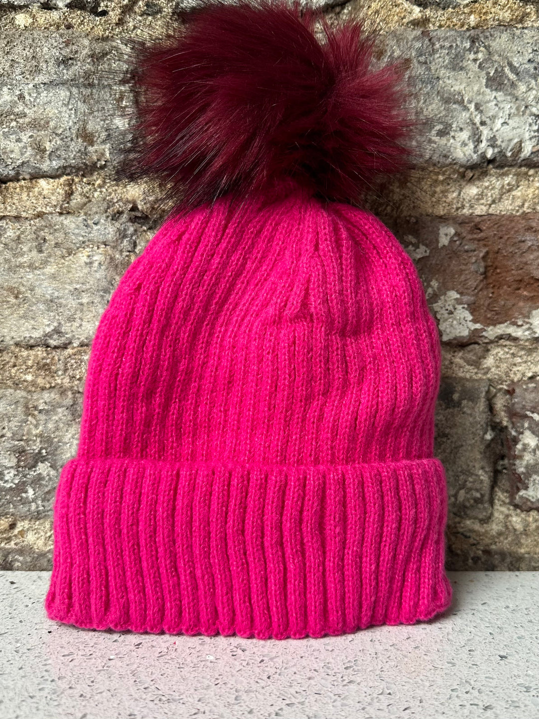 Hot pink bobble hat online